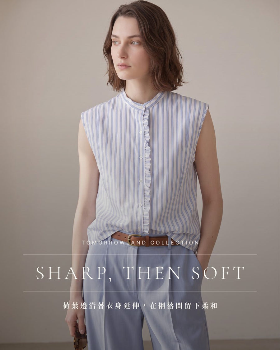 TOMORROWLAND collection — SHARP, THEN SOFT:清晰條紋之間,荷葉邊沿衣身展開,讓襯衫多了柔和起伏。