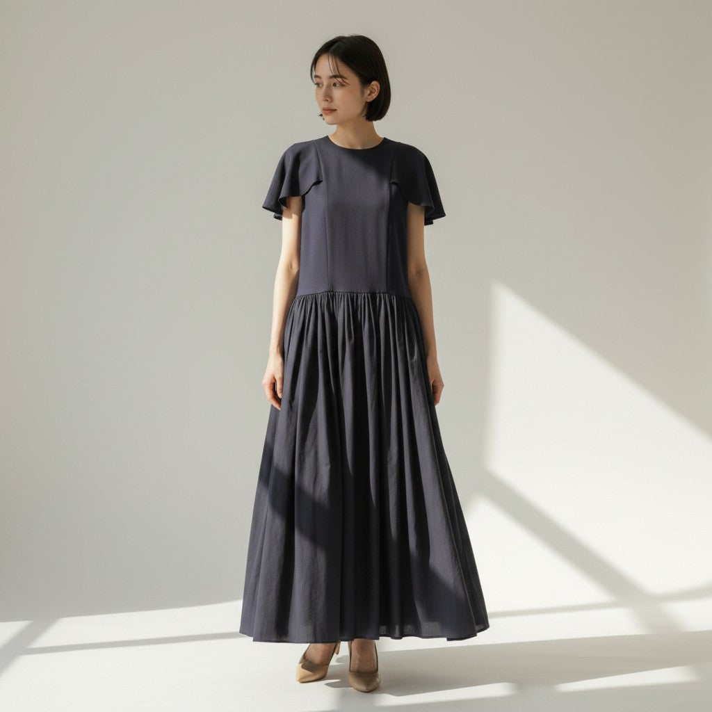 NANOKA LIVING 深藍色花瓣袖拼接長洋裝，傘狀裙襬設計，適合日常穿著。