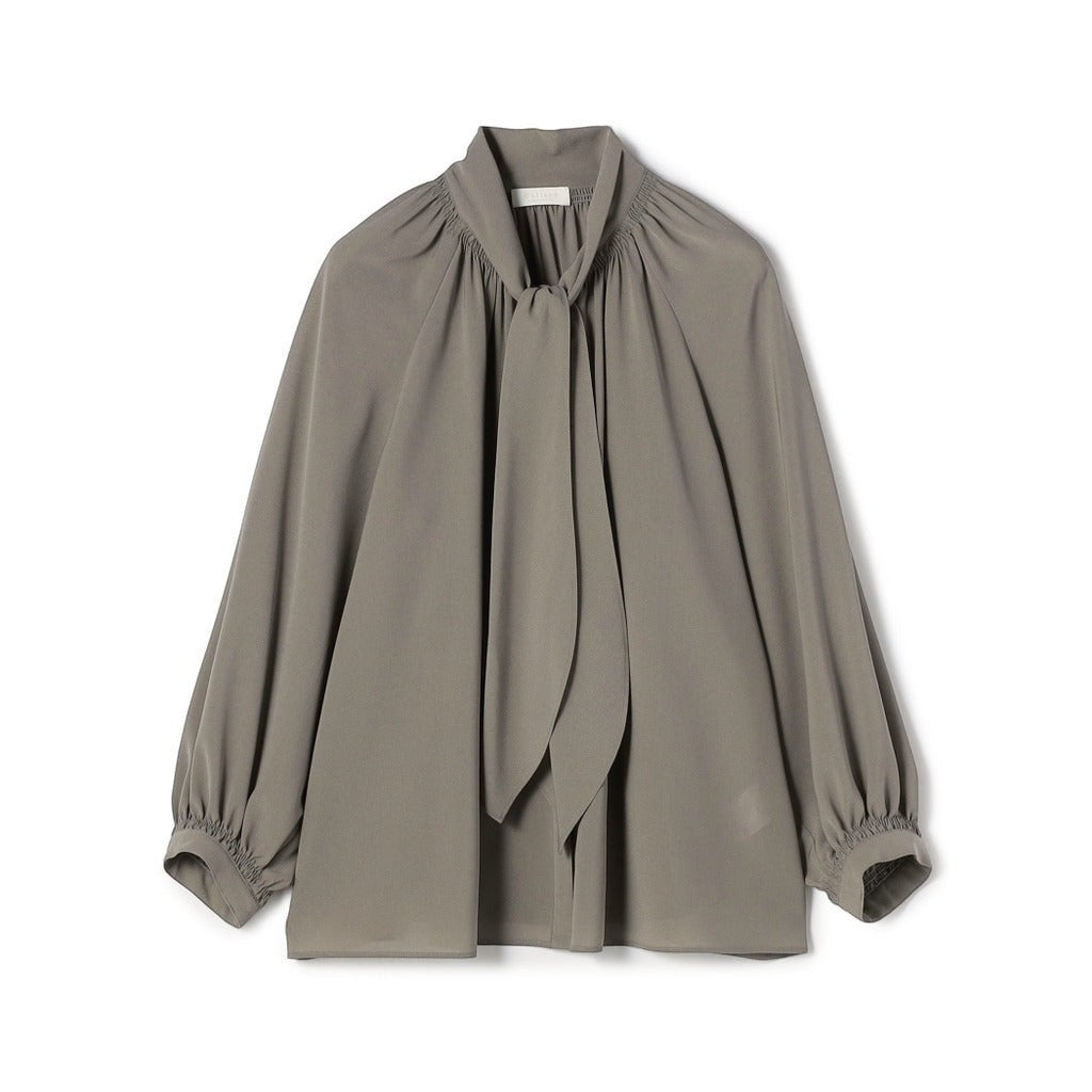 NANOKA LIVING ｜和洋選品 light grey sheer blouse with a tie-neck scarf collar and gathered long sleeves